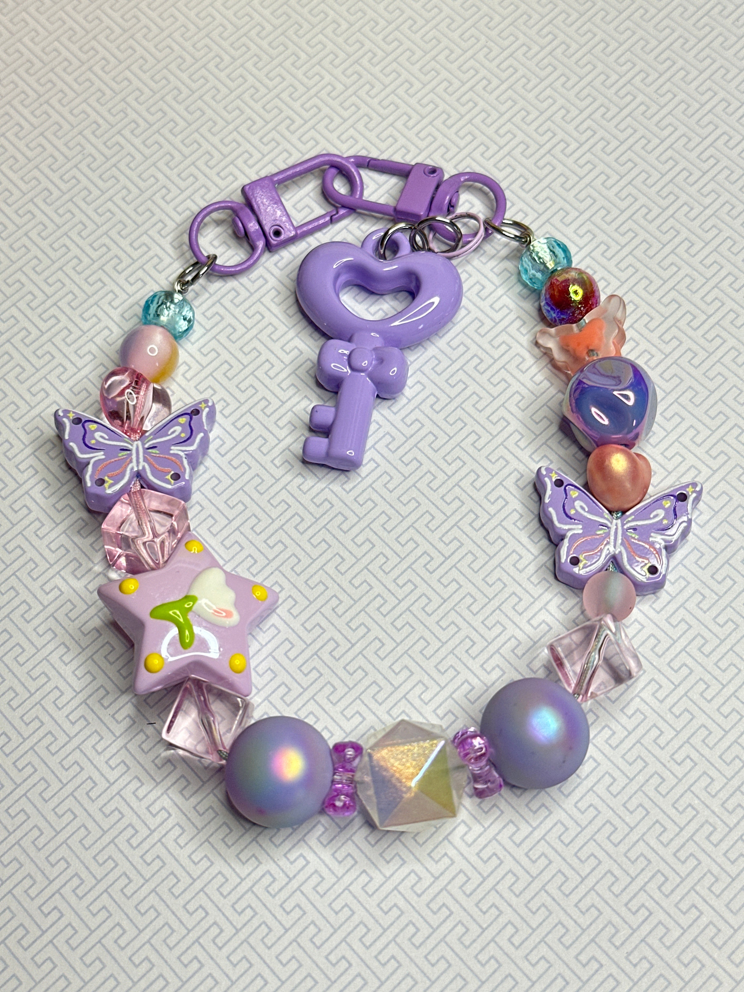 K236 Key to the Cosmos Pastel Butterfly Bag Charm Keychain
